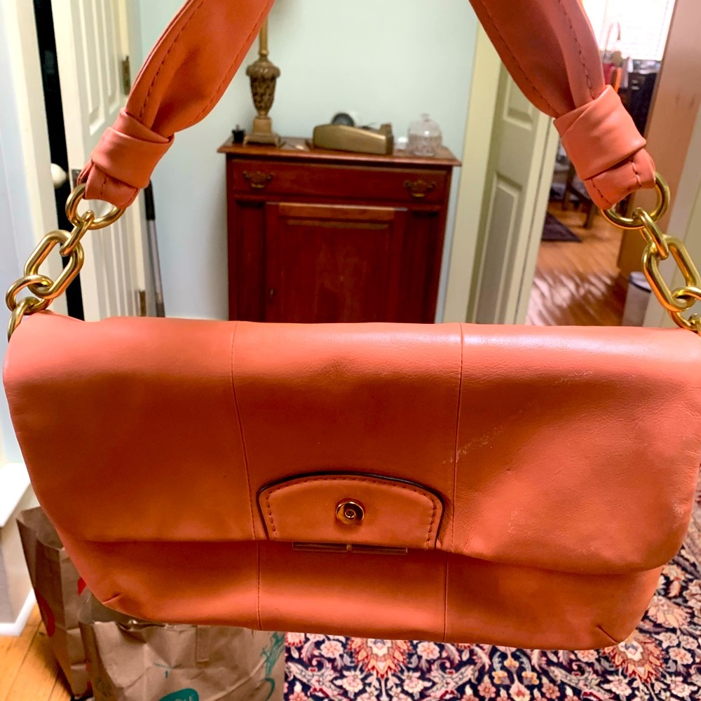 Coach light pink / cream purse.